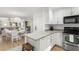 Modern kitchen with stainless steel appliances and granite countertops at 4545 Park Lake Dr, Kiawah Island, SC 29455
