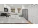 Kitchen features granite countertops and stainless steel appliances at 4545 Park Lake Dr, Kiawah Island, SC 29455