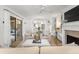 Bright and airy living room with access to kitchen and patio at 4545 Park Lake Dr, Kiawah Island, SC 29455
