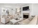 Open living space with built-ins, fireplace, and view of dining area at 4545 Park Lake Dr, Kiawah Island, SC 29455