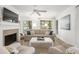 Spacious living area featuring a fireplace and comfortable seating at 4545 Park Lake Dr, Kiawah Island, SC 29455