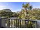 Balcony view of lush landscaping and neighborhood at 4995 Green Dolphin Way, Kiawah Island, SC 29455
