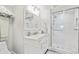 Bright bathroom with white vanity and shower at 4995 Green Dolphin Way, Kiawah Island, SC 29455