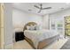 Main bedroom with wicker bed and balcony access at 4995 Green Dolphin Way, Kiawah Island, SC 29455