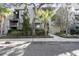 Attractive condo building with lush landscaping and convenient walkway at 4995 Green Dolphin Way, Kiawah Island, SC 29455