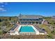 Aerial view of resort pool, expansive deck and surrounding landscape at 4995 Green Dolphin Way, Kiawah Island, SC 29455