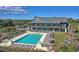 Luxury pool with spacious deck and clubhouse in background at 4995 Green Dolphin Way, Kiawah Island, SC 29455