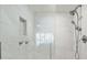 Modern shower with glass enclosure and marble tile at 4995 Green Dolphin Way, Kiawah Island, SC 29455