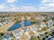 Aerial view of neighborhood with pond and houses at 5225 Mulholland Dr, Summerville, SC 29485
