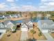 Aerial view of house and neighborhood, showcasing pond at 5225 Mulholland Dr, Summerville, SC 29485