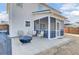 Spacious backyard patio with fire pit and seating area adjacent to house at 5225 Mulholland Dr, Summerville, SC 29485