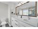 Elegant bathroom with double vanity, quartz countertops, and a large shower at 5225 Mulholland Dr, Summerville, SC 29485