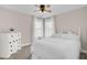 Charming bedroom with a white dresser and ruffles bedding at 5225 Mulholland Dr, Summerville, SC 29485