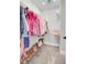 Well-organized closet with custom shelving for clothes and shoes at 5225 Mulholland Dr, Summerville, SC 29485