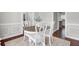 Elegant dining room with hardwood floors and white chairs at 5225 Mulholland Dr, Summerville, SC 29485