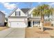 Two story house with a large yard and palm tree at 5225 Mulholland Dr, Summerville, SC 29485