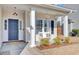 Charming front porch with white columns and a bench at 5225 Mulholland Dr, Summerville, SC 29485