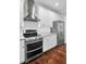 Stainless steel appliances and white shaker cabinets highlight this gorgeous kitchen at 5225 Mulholland Dr, Summerville, SC 29485