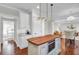 Kitchen island with butcher block countertop and built-in oven at 5225 Mulholland Dr, Summerville, SC 29485