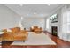 Spacious living room with a fireplace and leather sectional sofa at 5225 Mulholland Dr, Summerville, SC 29485