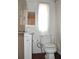Simple bathroom with toilet and vanity sink at 6321 Bears Bluff Rd, Wadmalaw Island, SC 29487