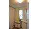 Clean bathroom with shower, sink, and storage at 6321 Bears Bluff Rd, Wadmalaw Island, SC 29487