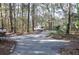 Gravel driveway with vehicle parking area at 6321 Bears Bluff Rd, Wadmalaw Island, SC 29487