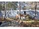 Mobile home exterior with a deck and sitting area at 6321 Bears Bluff Rd, Wadmalaw Island, SC 29487
