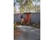 Mobile home's front entrance with red door, wooden steps, and potted plants at 6321 Bears Bluff Rd, Wadmalaw Island, SC 29487