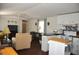 Open kitchen with white cabinets and wood flooring at 6321 Bears Bluff Rd, Wadmalaw Island, SC 29487