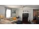 Comfortable living room with hardwood floors and large windows at 6321 Bears Bluff Rd, Wadmalaw Island, SC 29487