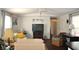 Bright living room featuring hardwood floors and a ceiling fan at 6321 Bears Bluff Rd, Wadmalaw Island, SC 29487