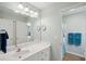 Bathroom with white vanity, single sink, and shower/tub combo at 804 E Ashley Ave, Folly Beach, SC 29439