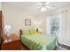 Bright bedroom with a lemon-themed bedspread and built-in closet at 804 E Ashley Ave, Folly Beach, SC 29439