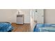 Bedroom with two twin beds and coastal decor, view of hallway at 804 E Ashley Ave, Folly Beach, SC 29439