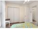 Bedroom with white doors and wood flooring at 804 E Ashley Ave, Folly Beach, SC 29439