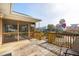 Wooden deck with stairs leading down to the yard at 804 E Ashley Ave, Folly Beach, SC 29439