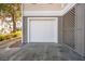 White garage door with a decorative lattice at 804 E Ashley Ave, Folly Beach, SC 29439