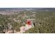 Aerial view of a house nestled in a wooded area at 8978 Victor Lincoln Rd, McClellanville, SC 29458