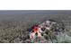 Aerial view of property with surrounding forest at 8978 Victor Lincoln Rd, McClellanville, SC 29458