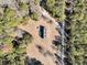 Aerial view of house on wooded lot at 8978 Victor Lincoln Rd, McClellanville, SC 29458