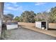 Large backyard with shed and doghouse at 8978 Victor Lincoln Rd, McClellanville, SC 29458