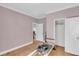 Pastel bedroom with hardwood floors and closet at 8978 Victor Lincoln Rd, McClellanville, SC 29458