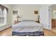 Bedroom with double bed, nightstands and hardwood floors at 8978 Victor Lincoln Rd, McClellanville, SC 29458