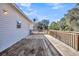 Large wooden deck with access from the house at 8978 Victor Lincoln Rd, McClellanville, SC 29458