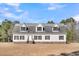 Exterior of a one-story house with gray roof at 8978 Victor Lincoln Rd, McClellanville, SC 29458