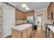 Kitchen with stainless steel appliances and wood cabinets at 8978 Victor Lincoln Rd, McClellanville, SC 29458