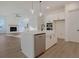 Open-concept kitchen featuring a large island, stainless steel appliances, and hardwood floors at 0 United Dr, Huger, SC 29450