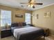 Bedroom with double bed, ceiling fan, and neutral walls at 1001 Shinnecock Hills Ct, Summerville, SC 29483