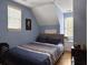 Upstairs bedroom with a double bed and blue walls at 1001 Shinnecock Hills Ct, Summerville, SC 29483